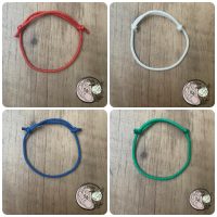 Színes fonal karkötők